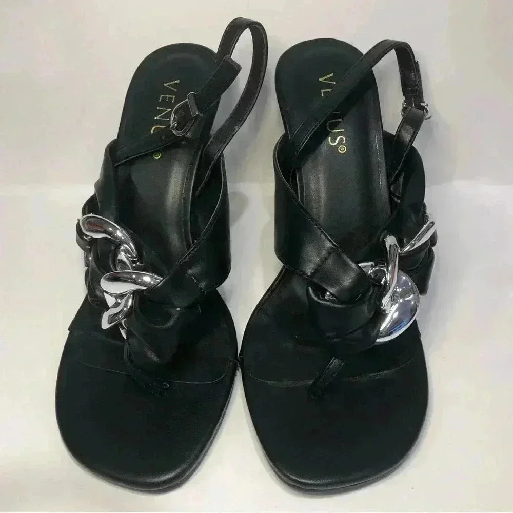 Black and silver heels size 7.5